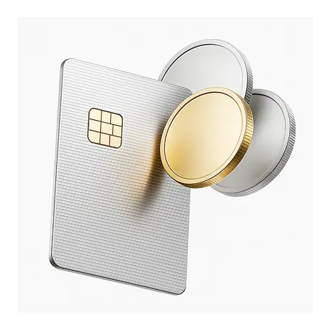 Silver credit card with embedded chip alongside three coins, one gold and two silver.
